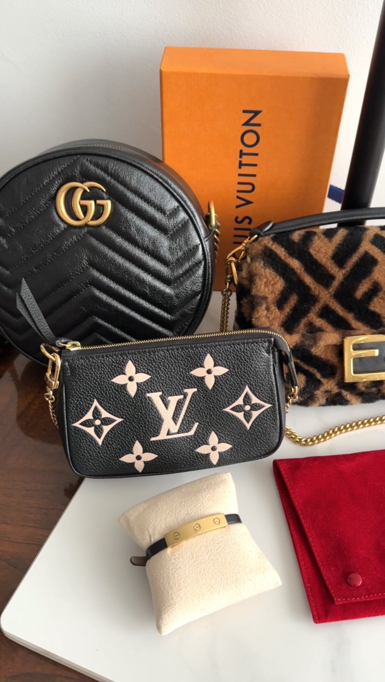 Louis Vuitton Bicolour Mini Pochette Accessoires Empreinte Monogram
