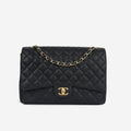 Chanel Maxi Classic Flap - Black Caviar