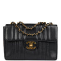 Chanel Vintage Jumbo Mademoiselle Vertical Flap Black Caviar Gold Hardware