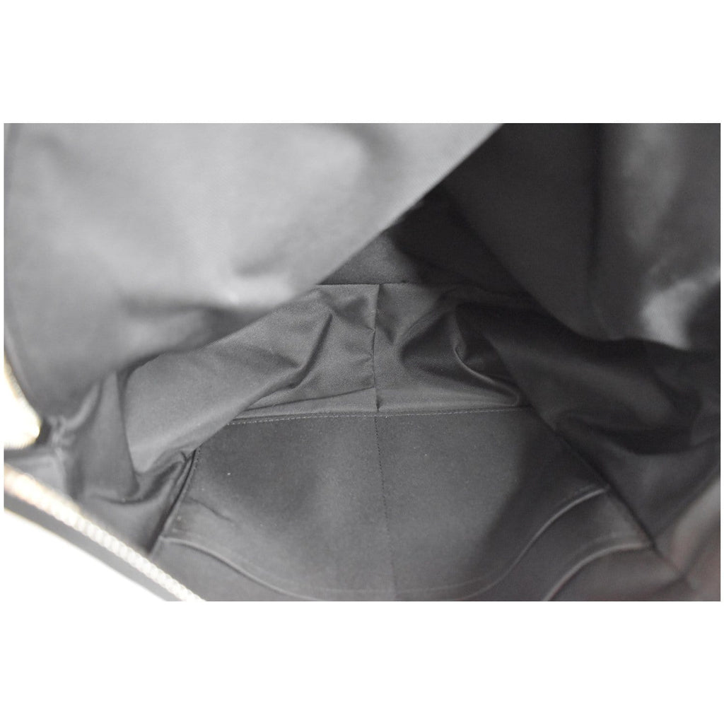 LOUIS VUITTON Discovery PM Taiga Monogram Leather Backpack White