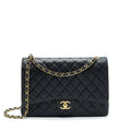 Chanel Maxi Classic Double Flap Caviar black  serial 20