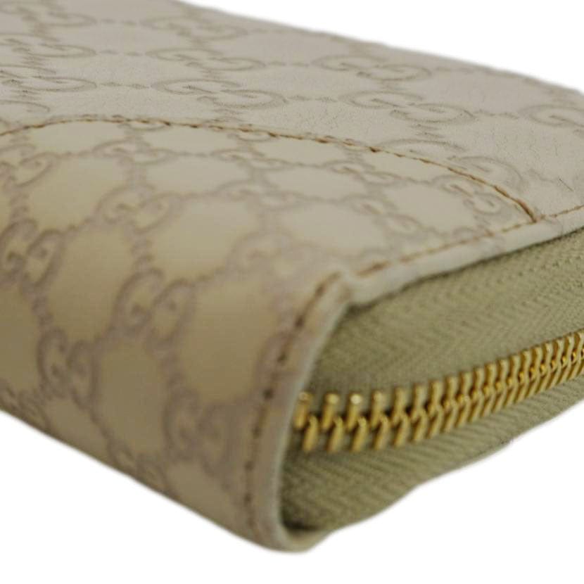 GUCCI GG Canvas Zippy Wallet White 323397