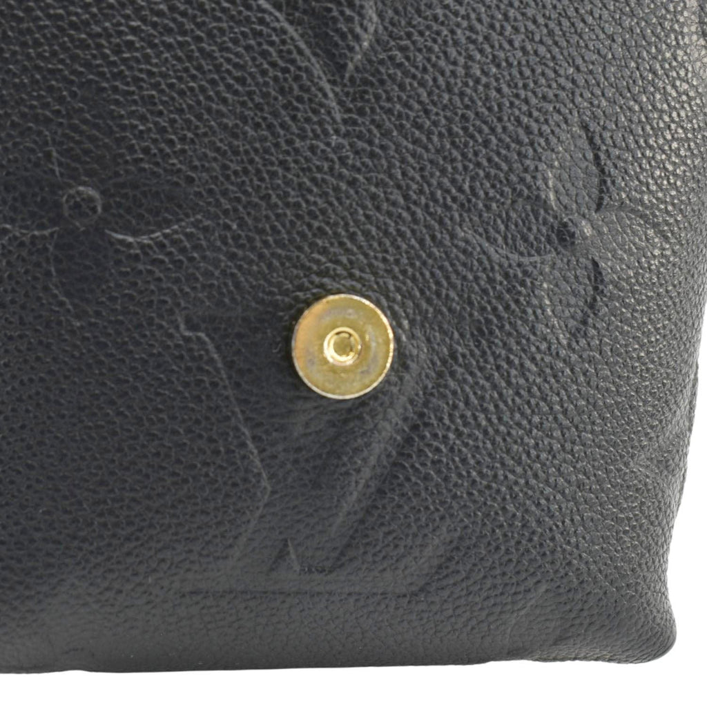 LOUIS VUITTON Tiny Monogram Empreinte Leather Backpack Black