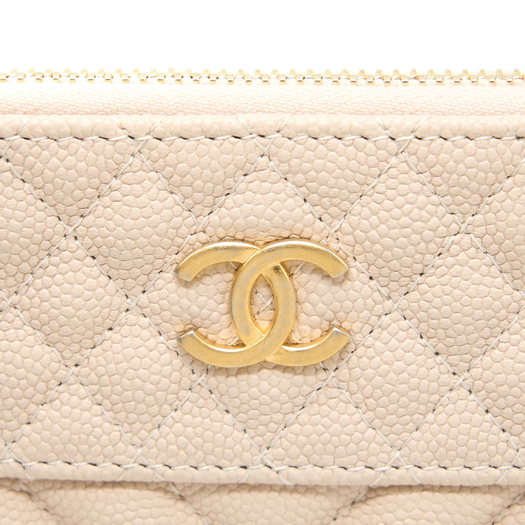 Chanel Clutch Chevron Caviar Beige