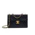 Chanel Vintage Maxi Flap Bag Black 24K