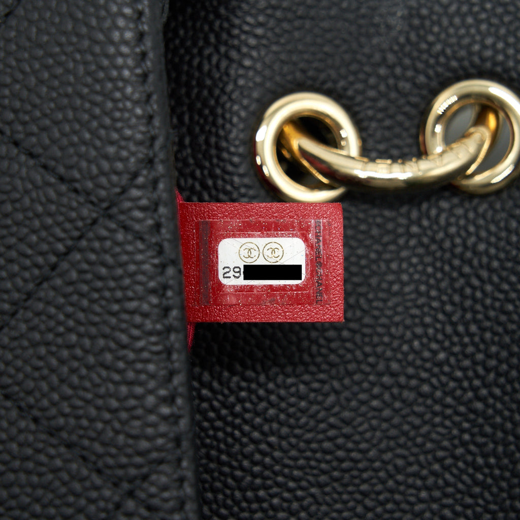 Chanel Caviar quilted flap Bag with handle and Chain Black L