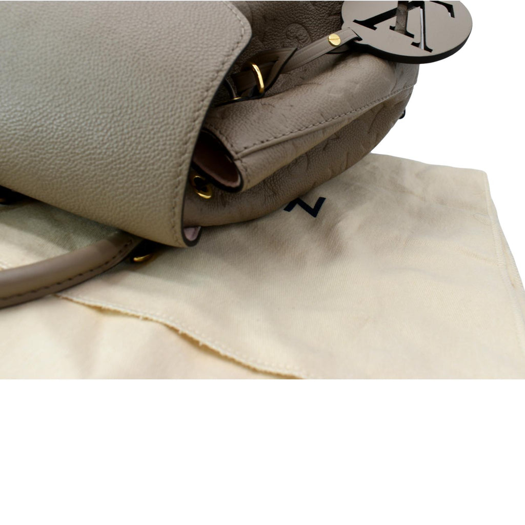 LOUIS VUITTON Montsouris Monogram Empreinte Leather Backpack Beige