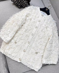 Chanel 21S off-white tassel igan