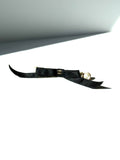 CHANEL Black Faux Pearl Bow CC Logo 2025 Gold hardware Hair Barrette Clip