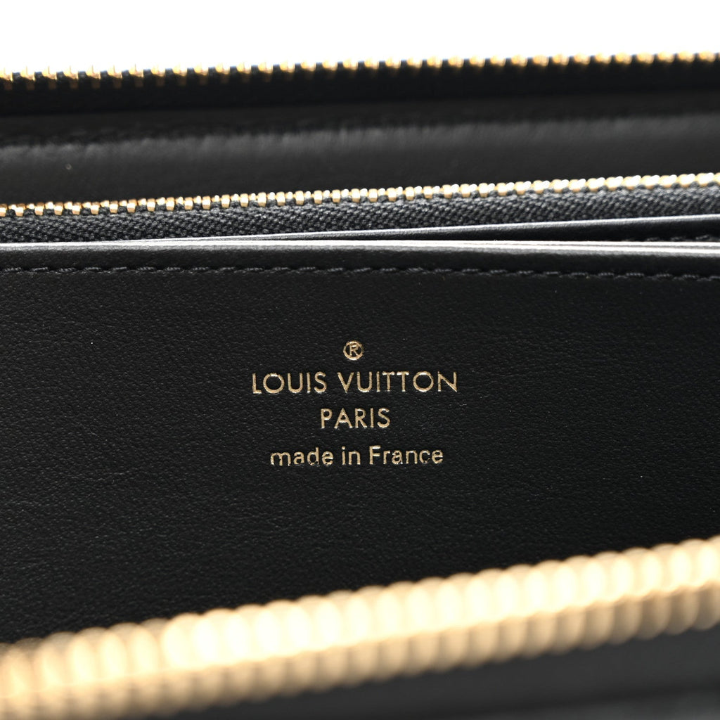 LOUIS VUITTON LAMBSKIN EMBOSSED MONOGRAM COUSSIN ZIPPY WALLET