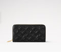 LOUIS VUITTON LAMBSKIN EMBOSSED MONOGRAM COUSSIN ZIPPY WALLET