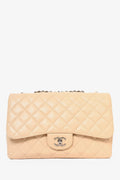 Pre-loved Chanel™ 2010/11 Beige Caviar Leather Jumbo Classic Flap Bag