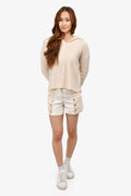 Pre-Loved Chanel™ 2018 Beige/White Denim Button Detailed Shorts Size 34