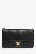 Pre-Loved Chanel™ 1991-94 Vintage Black Vertical Quilted Lambskin Medium CC Flap Bag