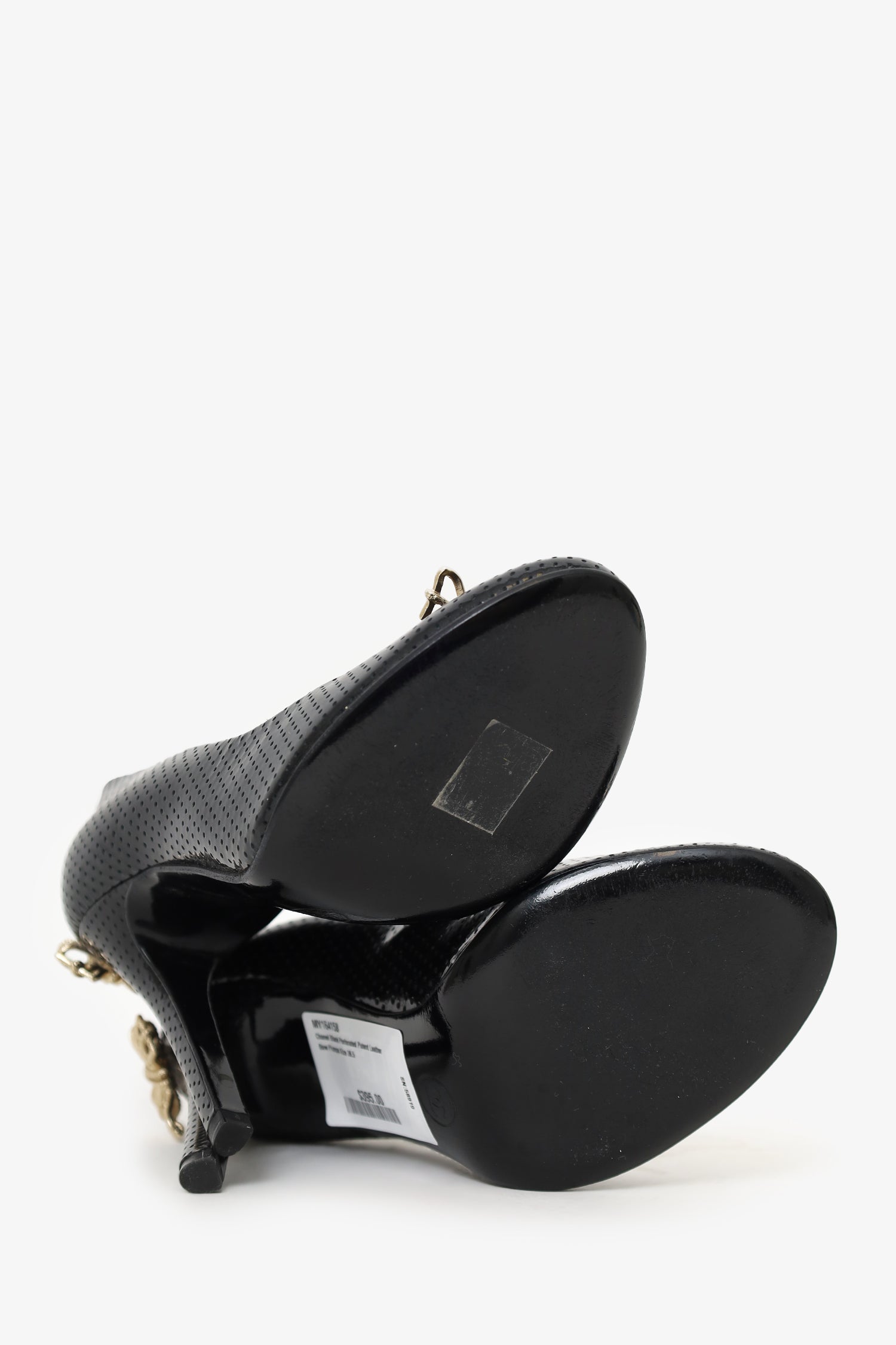 Pre-Loved Chanel™ Black Perforated Patent Leather Bow Pumps Size 36.5