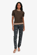 Pre-Loved Chanel™ 2022 Washed Black Metallic CC Tapered Jeans Size 36