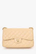 Pre-Loved Chanel™ 2010-11 Beige Caviar Leather Jumbo Classic Double Flap Bag