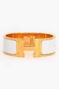 Hermès Gold Toned White Enamel Clic Clac Bracelet