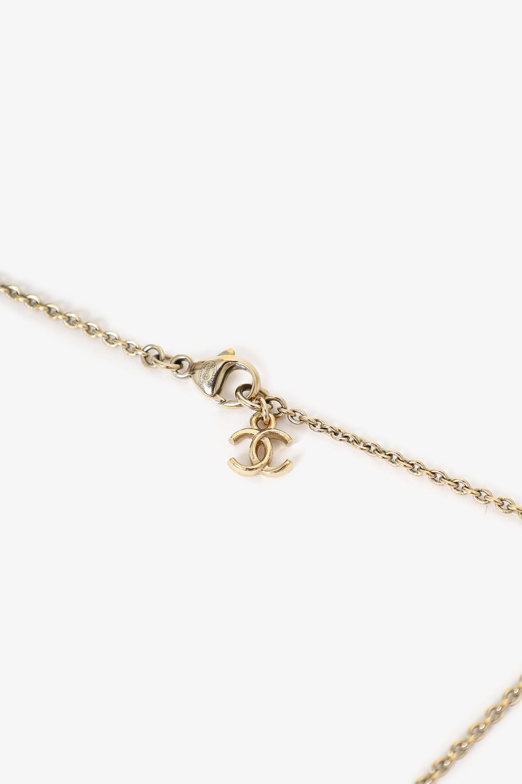 Pre-Loved Chanel™ Black Plastic Coco Chanel Pearl Tag Necklace