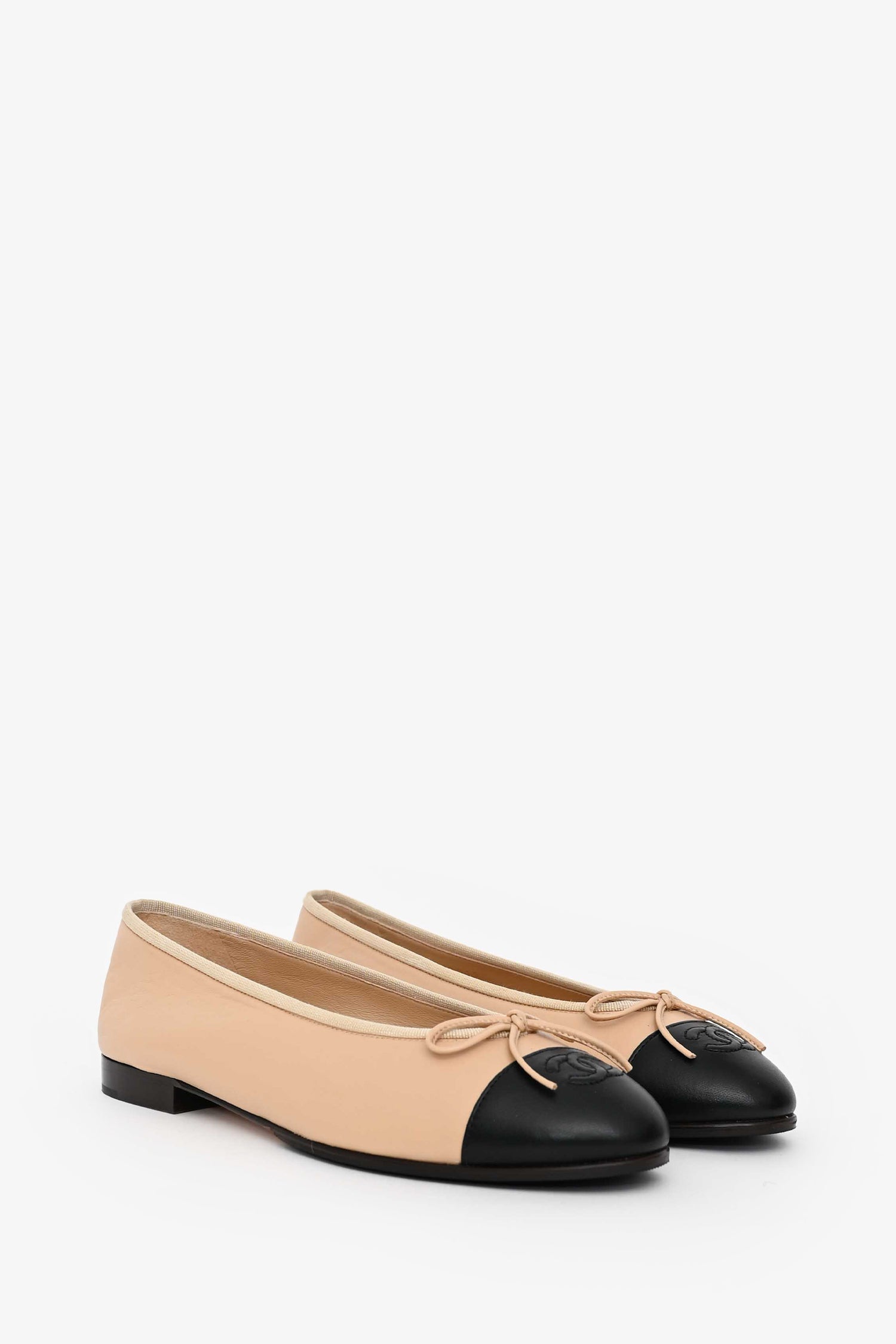 Pre-Loved Chanel™ Beige Black Cap Toe CC Ballet Flats Size 40