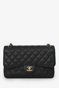 Pre-Loved Chanel™ 2012-13 Black Caviar Leather Jumbo Double Flap Shoulder Bag