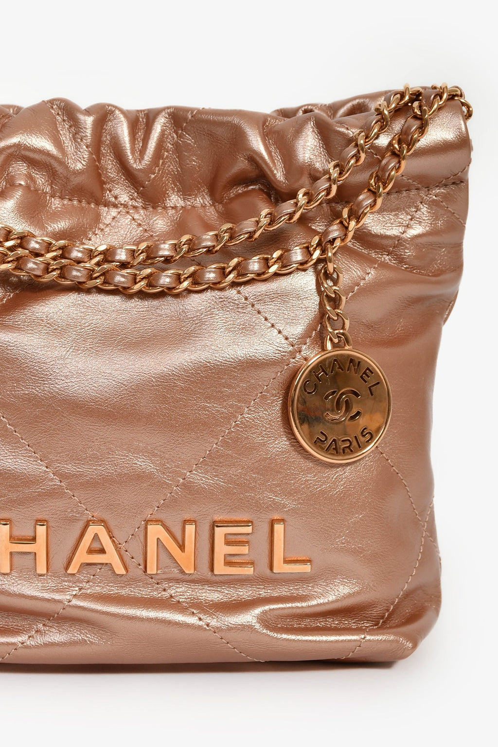 Pre-Loved Chanel™ 2021+ Rose Metallic Quilted Calfskin Mini Chanel 22 Hobo Bag
