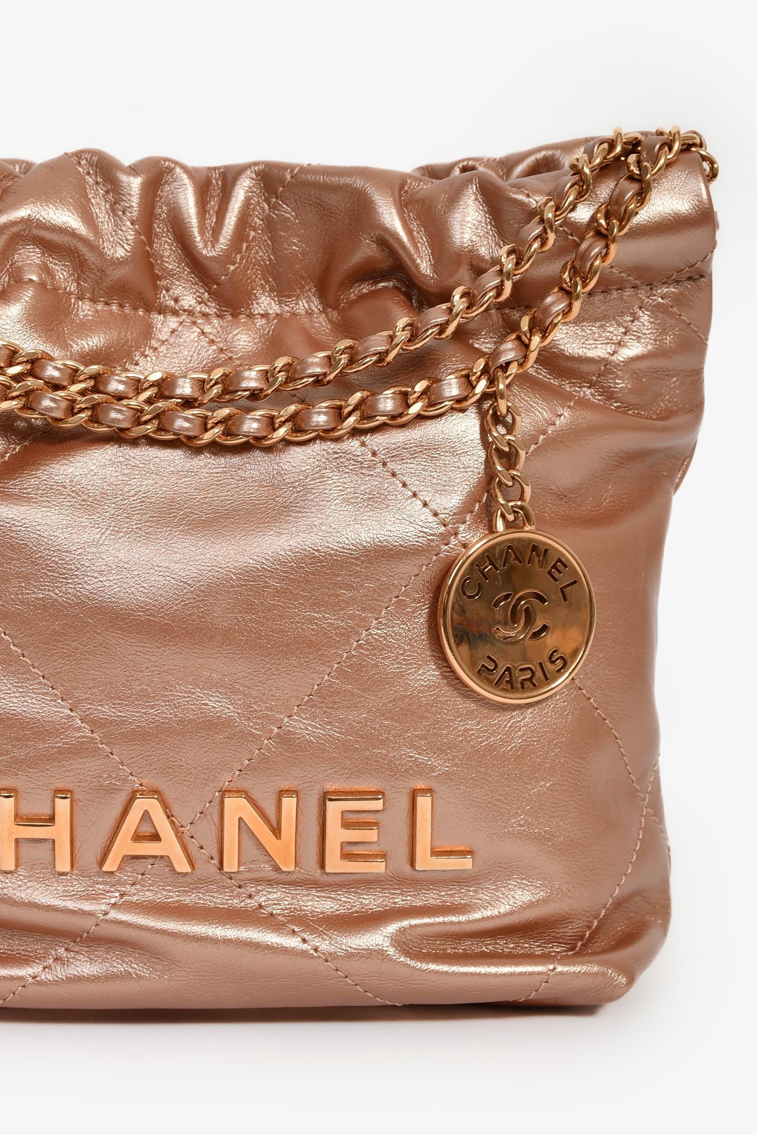 Pre-Loved Chanel™ 2021+ Rose Metallic Quilted Calfskin Mini Chanel 22 Hobo Bag