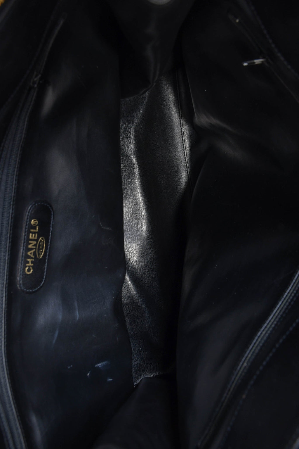 Pre-Loved Chanel™ 1991/94 Black Leather Quilted XL Supermodel Weekender Tote
