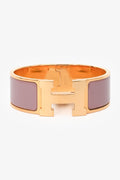 Hermès Gold Tone Pink Ceramic 'Clic Clac H' GM Bracelet