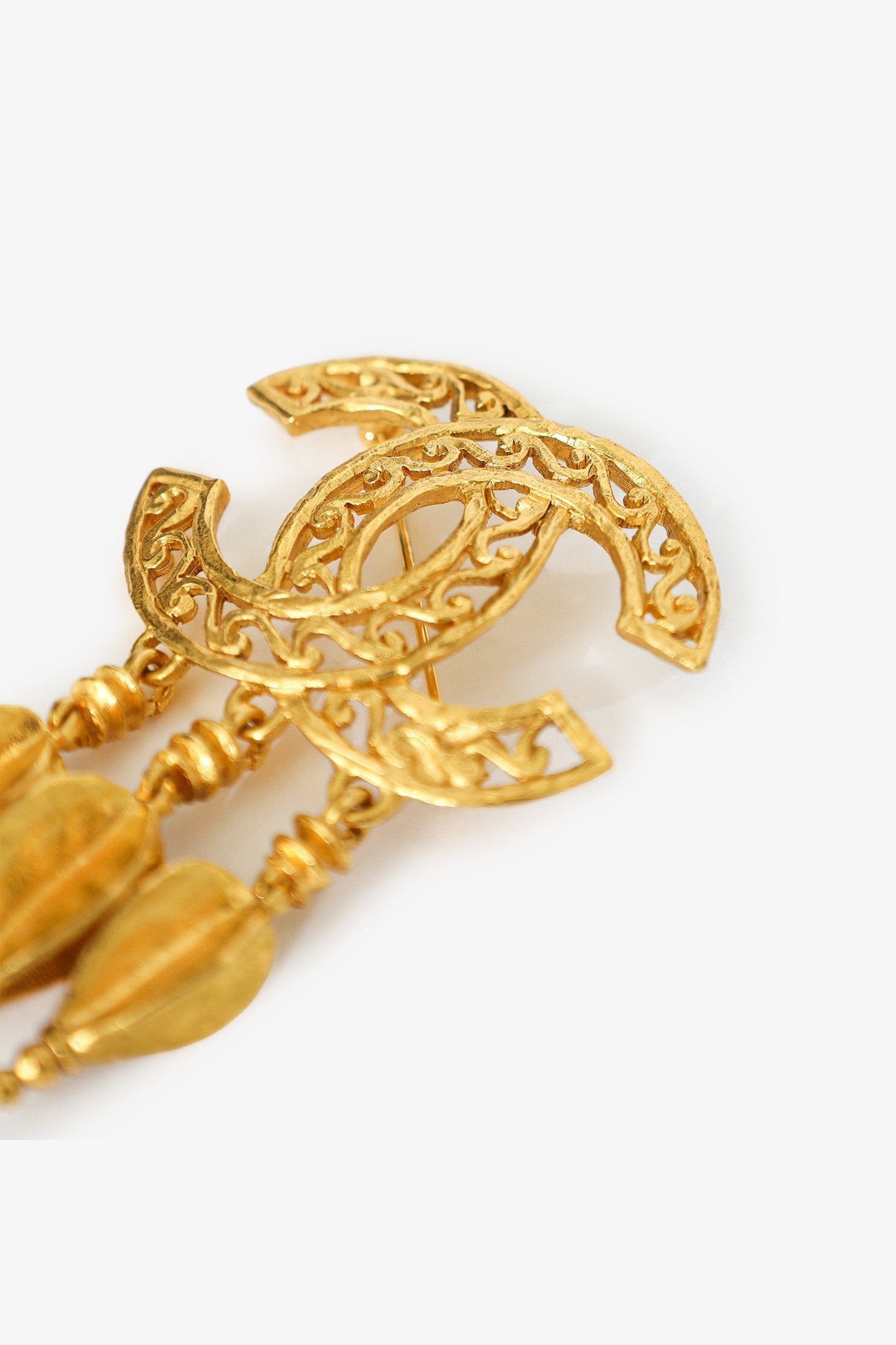 Pre-Loved Chanel™ Vintage Gold-tone Coco Mark Fretwork Fringe Brooch