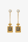 Pre-Loved Chanel™ Gold Tone Crystal Pearl CC Perfume Bottle Chain Drop Earrings