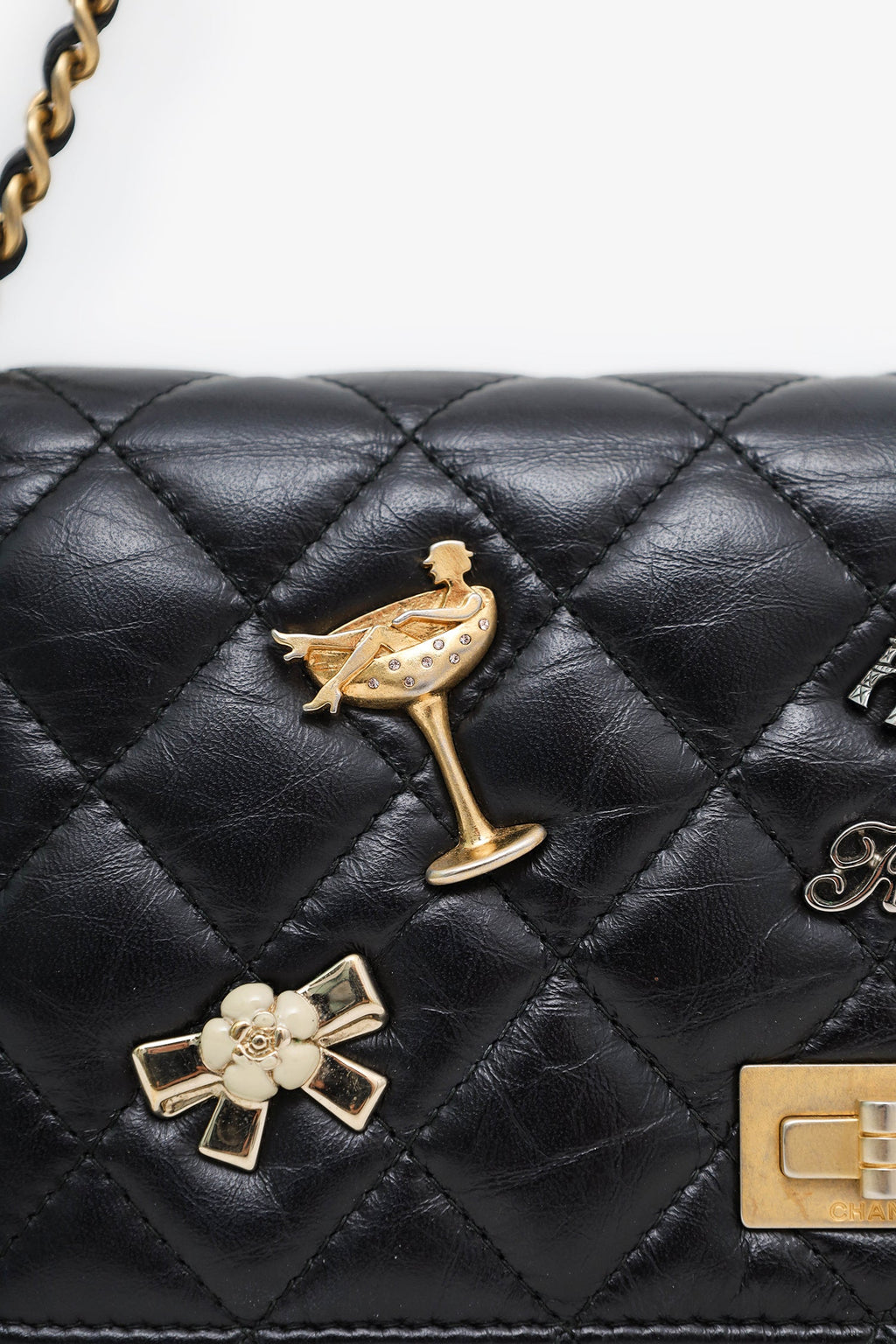 Pre-Loved Chanel™ Black Quilted Aged Calfskin Leather Lucky Charms 2.55 Reissue Wallet on Chain