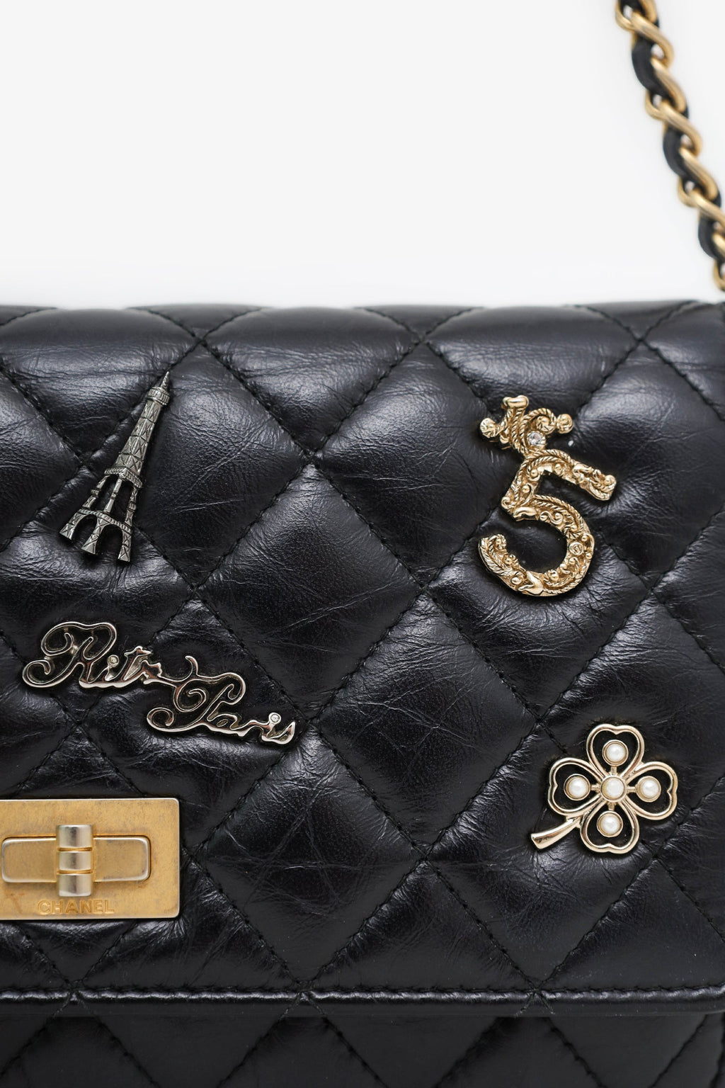 Pre-Loved Chanel™ Black Quilted Aged Calfskin Leather Lucky Charms 2.55 Reissue Wallet on Chain