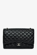 Pre-Loved Chanel™ 2011 Black Lambskin Maxi Single Flap Shoulder Bag