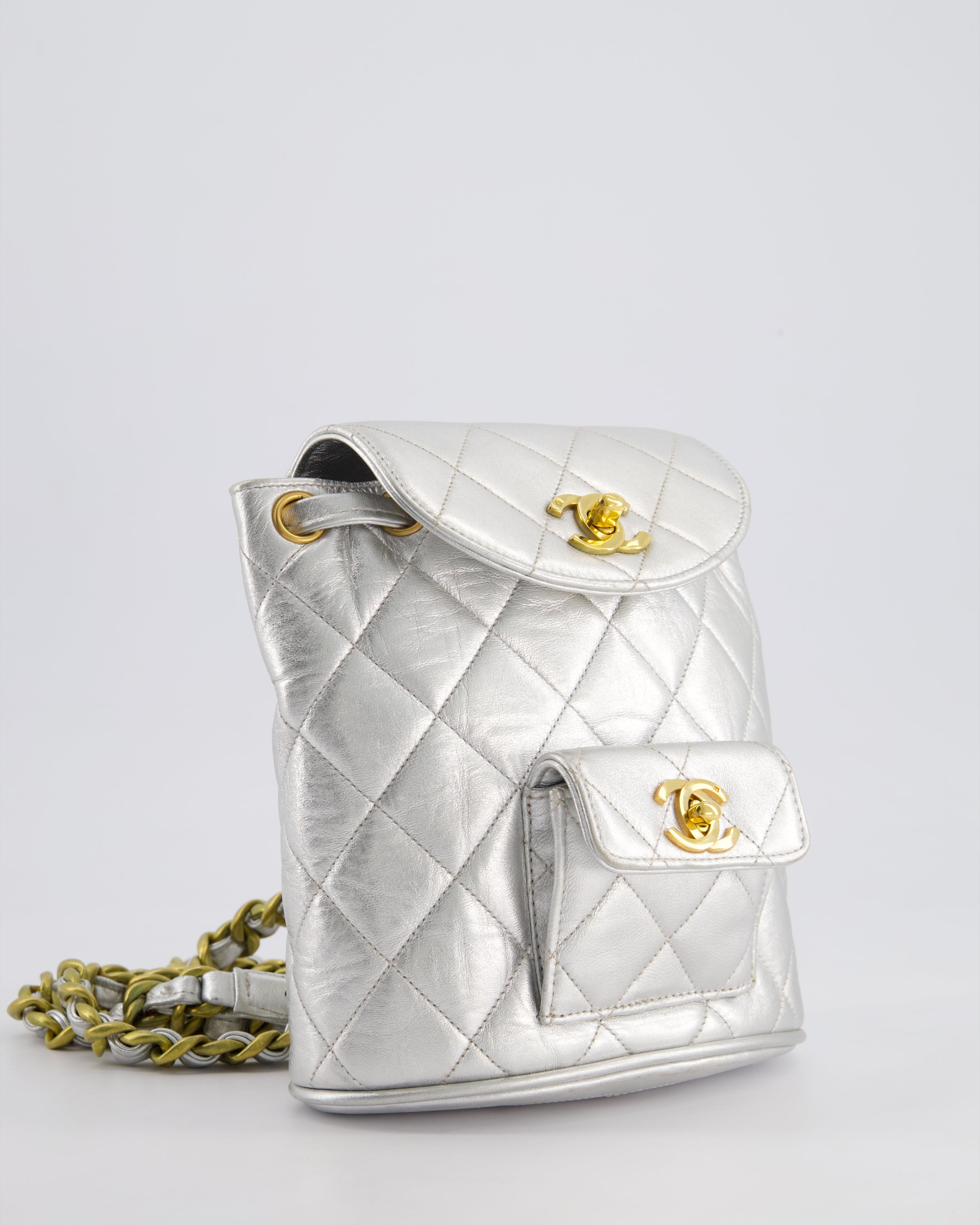 *RARE* Chanel Metallic Silver Vintage Mini Duma Backpack Bag in Lambskin Leather with 24K Gold Hardware
