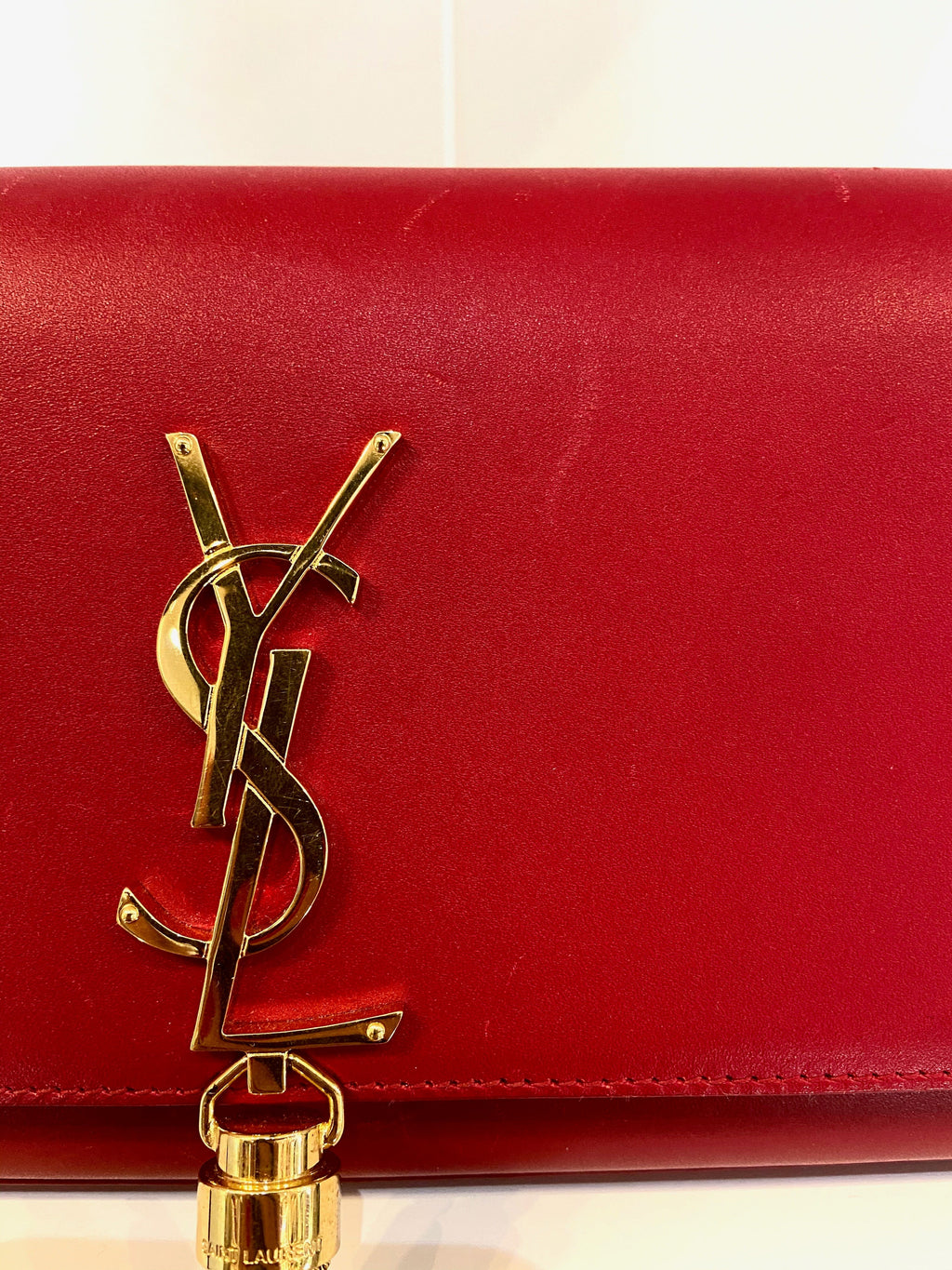 YVES SAINT LAURENT KATE LEATHER CLUTCH BAG ROUGE