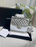CHANEL 24C BACKPACK WITH STAR PATENT SILVER LGHW (MICROCHIP)