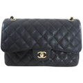 Chanel Black Caviar Jumbo Double Classic Flap Bag