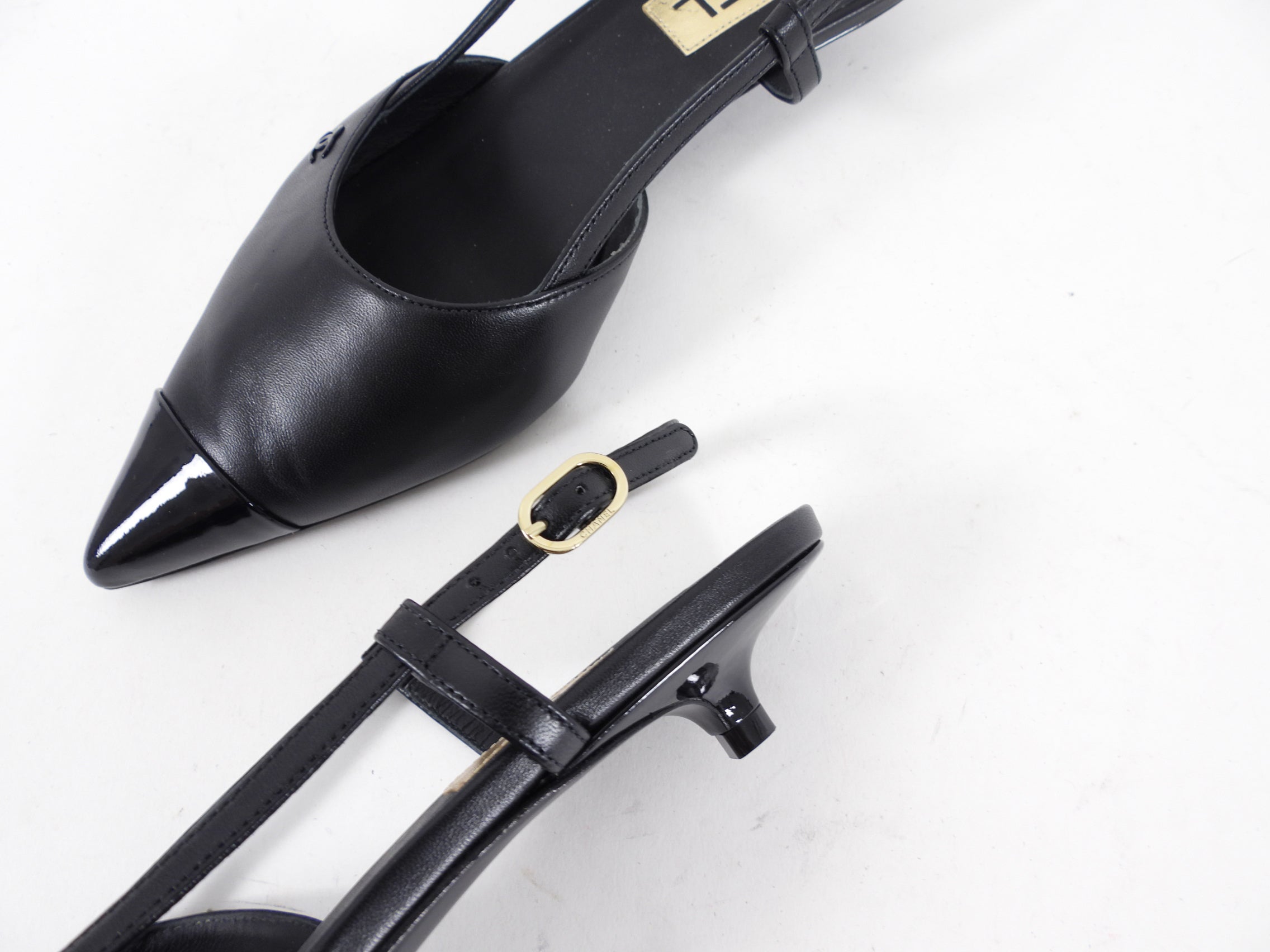 Chanel 22K Black Leather Cap Toe Slingback Kitten Heels - 36.5C